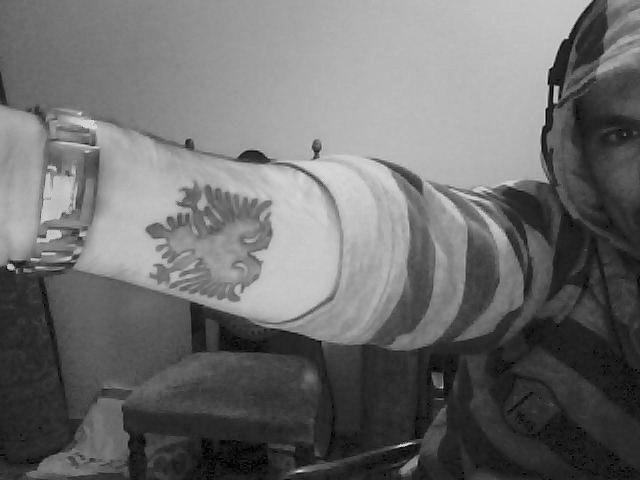 1238240900_344_FT19405_tatoo.jpg